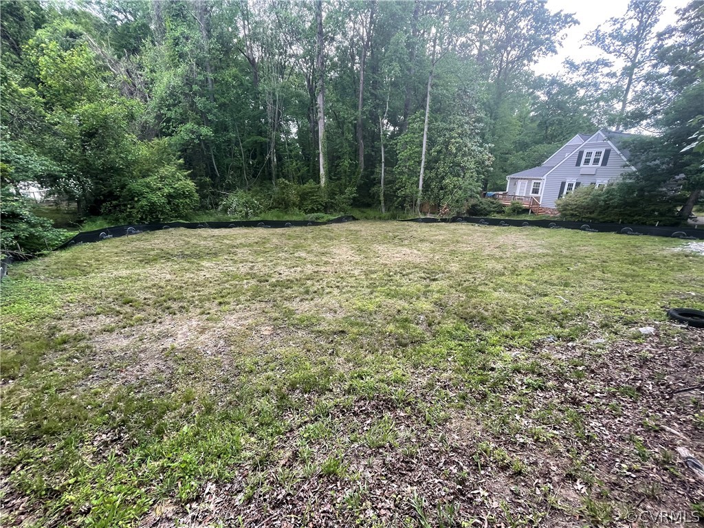 11516 Rolling Brook Road Chester, VA 23831 - Photo 4 of 7 a view of an outdoor space and a yard