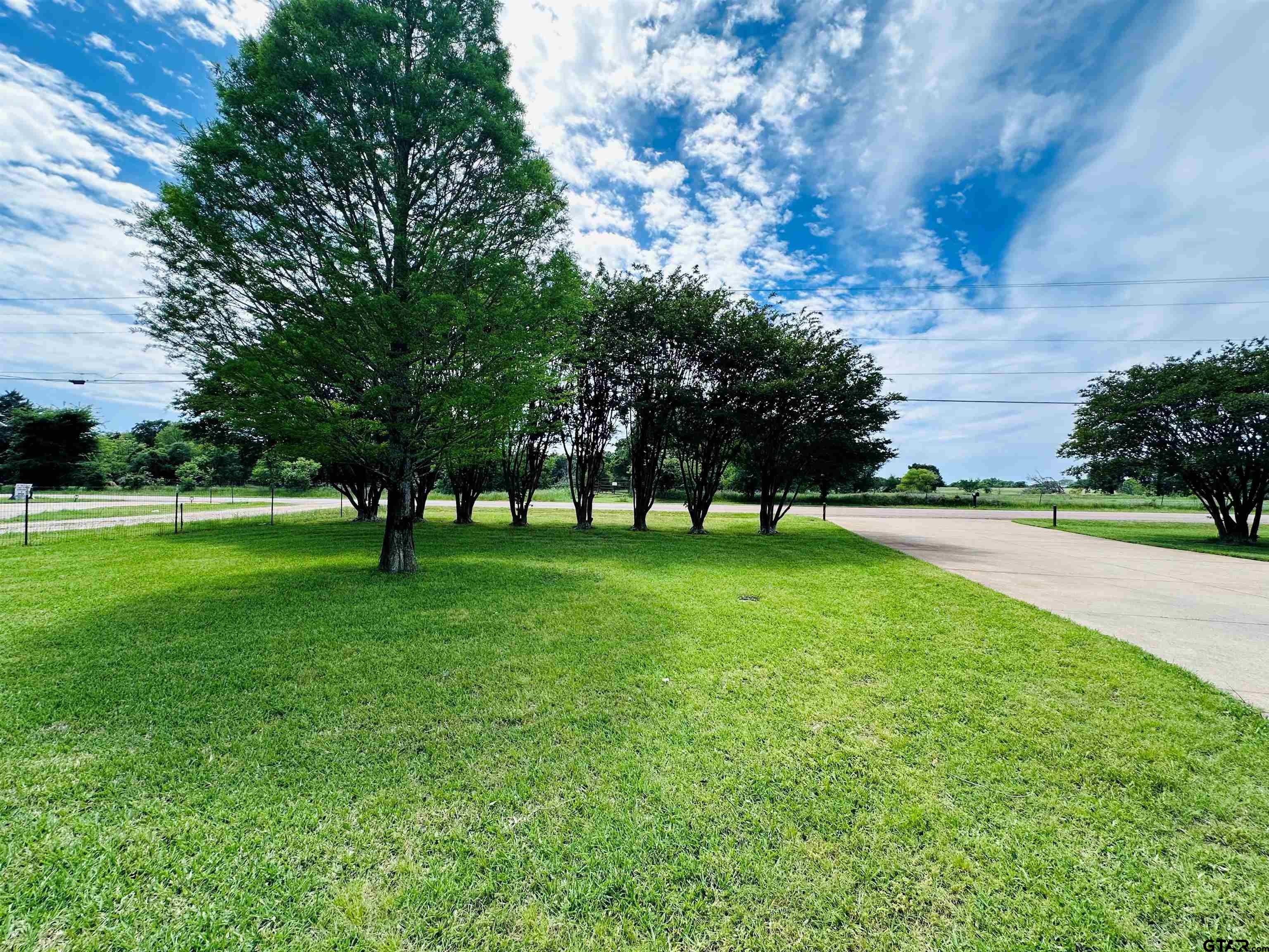 6454 Clear Creek Road Mabank, TX 75156 - Photo 14 of 17 a view of green field