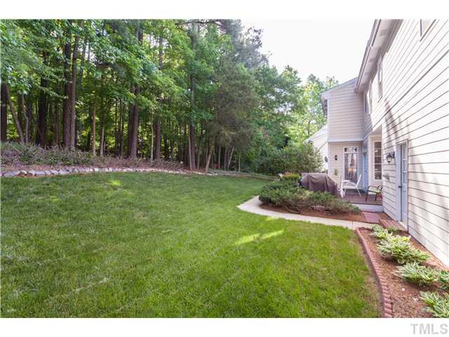 12405 Whartons Way Raleigh, NC 27613 - Photo 19 of 23 BEAUTIFUL VIEW OF THE LUSH GREEN LAWN AND PRIVATE TREE LINE. Back Yard
