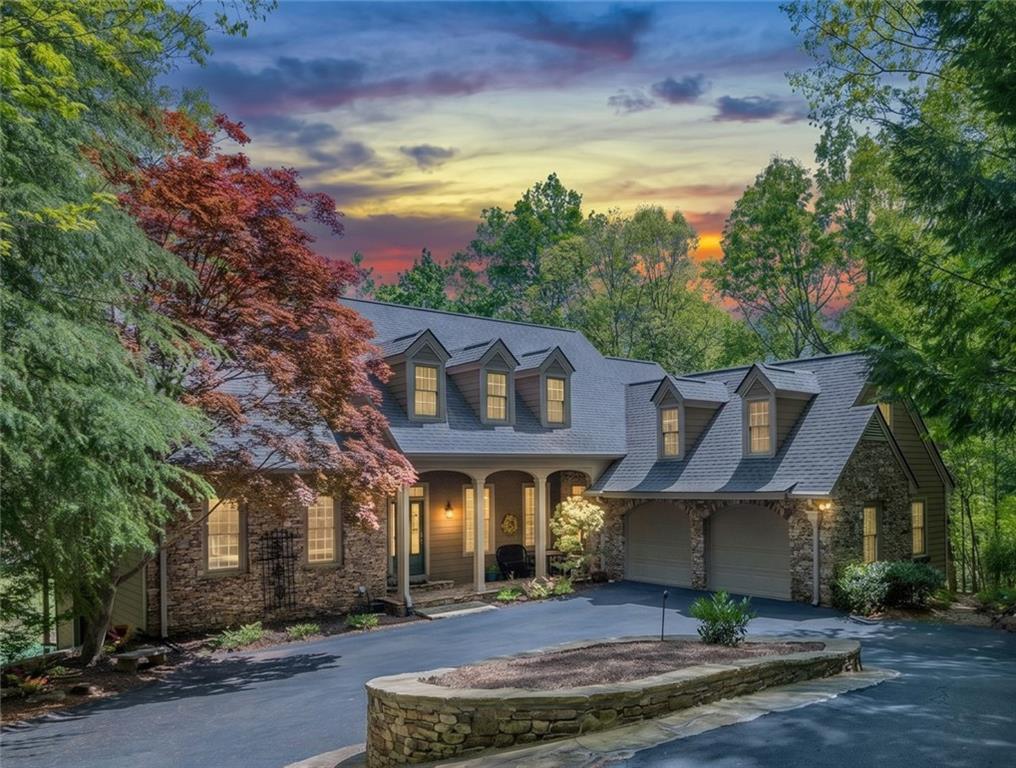 208 Muirfield Way Jasper, GA 30143 - Photo 2 of 59 a front view of a house with garden