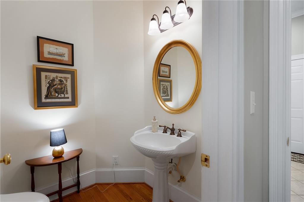 208 Muirfield Way Jasper, GA 30143 - Photo 30 of 59 a bathroom with a sink and a mirror