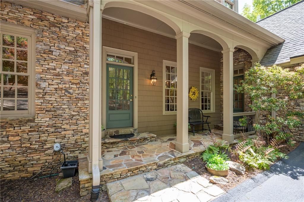 208 Muirfield Way Jasper, GA 30143 - Photo 3 of 59 a view of a door with a bench in front of door