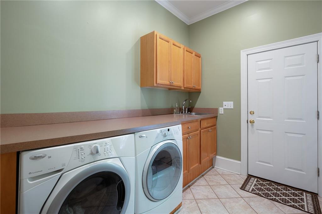 208 Muirfield Way Jasper, GA 30143 - Photo 31 of 59 a utility room with dryer and washer