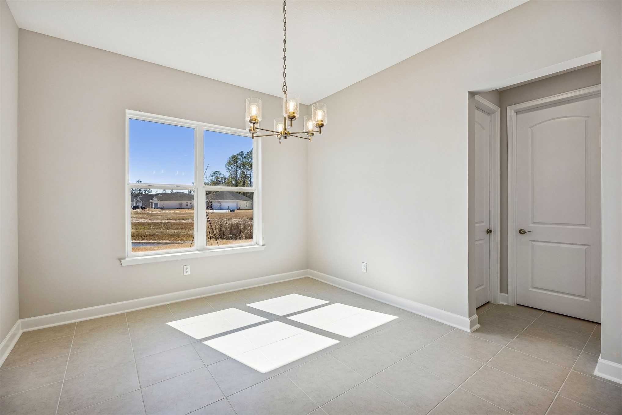 85417 Sandy Rdg Loop Yulee, FL 32097 - Photo 7 of 21 a view of an empty room with a window