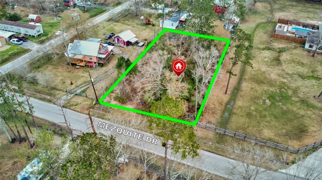 a sign that is sitting in front of flowers