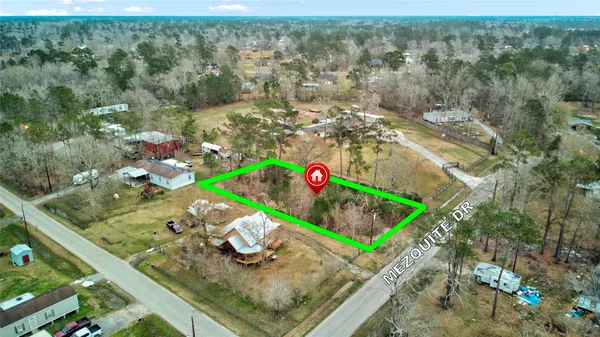 a view of swimming pool with seating area