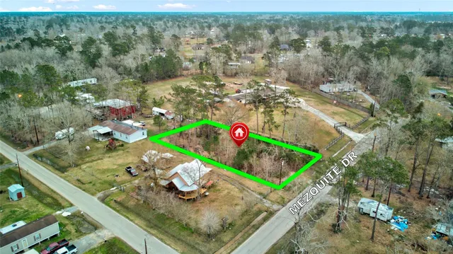 a view of swimming pool with seating area