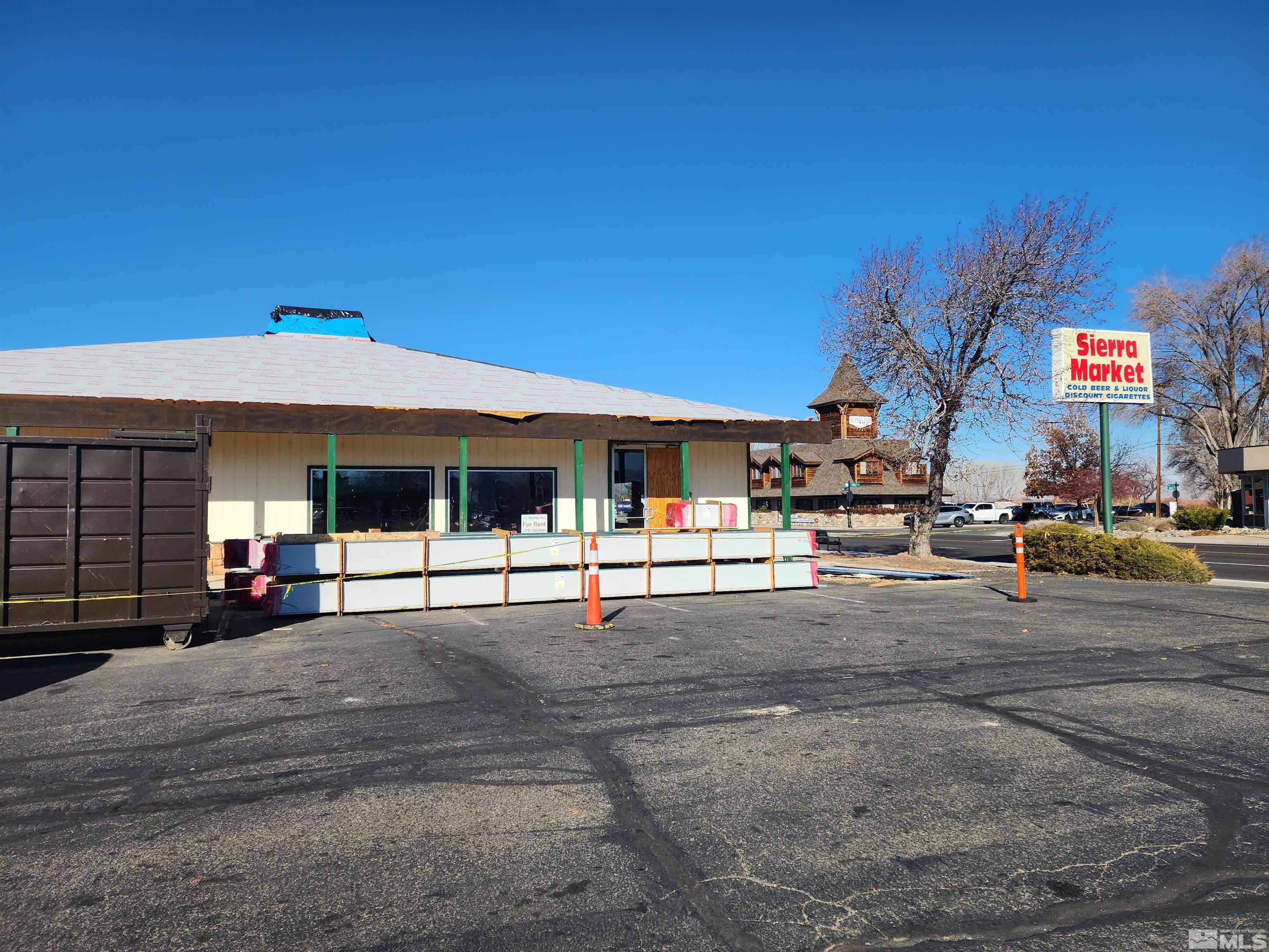 a view of a building with sitting area