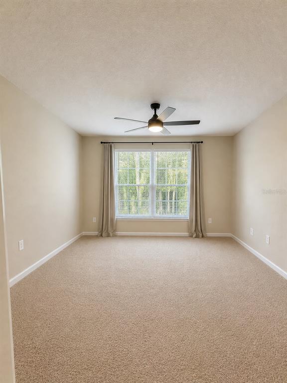 339 Redbud Road Palm Coast, FL 32137 - Photo 19 of 22 a view of an empty room with a window