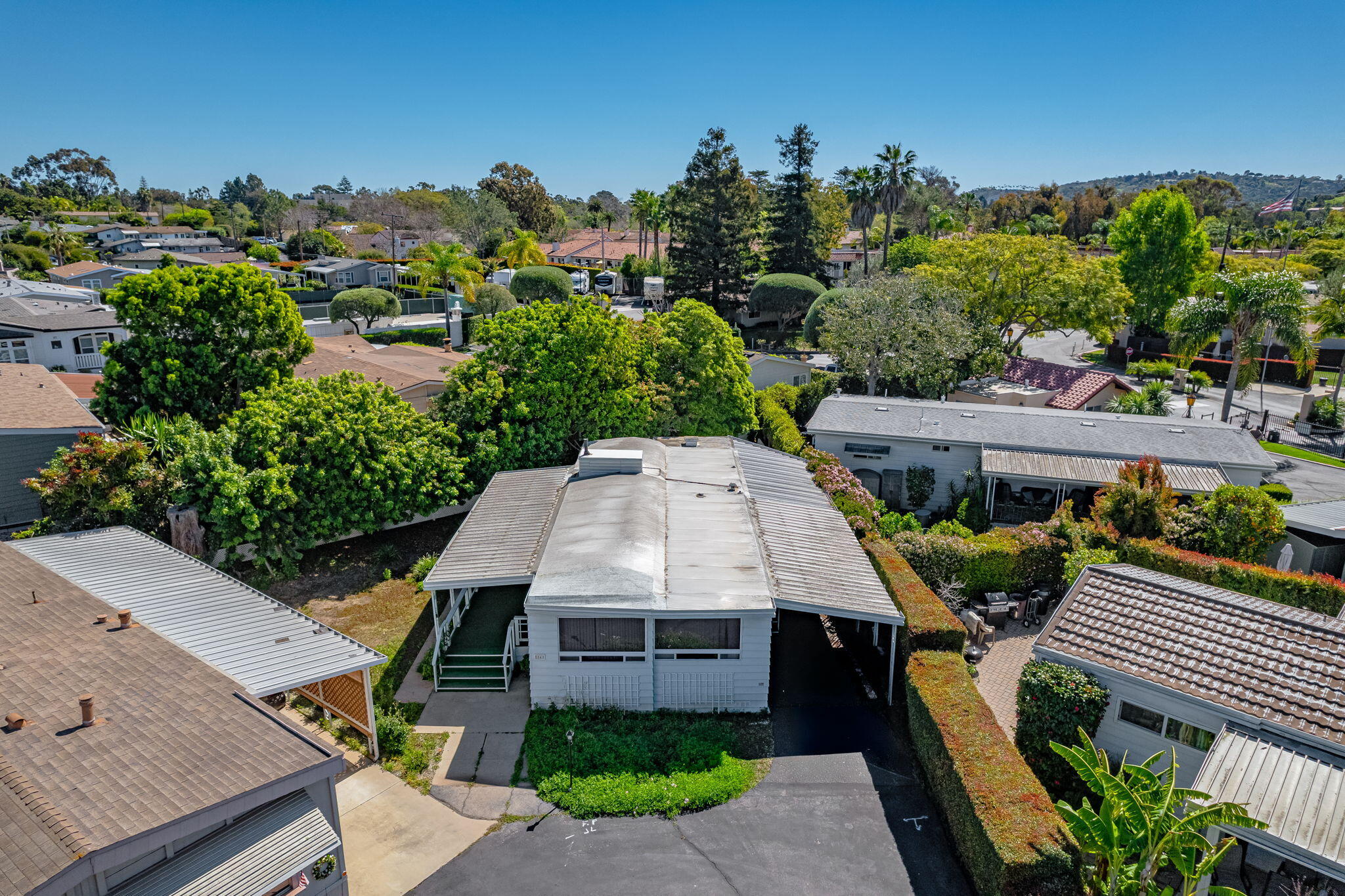 333 Old Mill Road, Unit 54 Santa Barbara, CA 93110 - Photo 3 of 13 a front view of a house with a yard