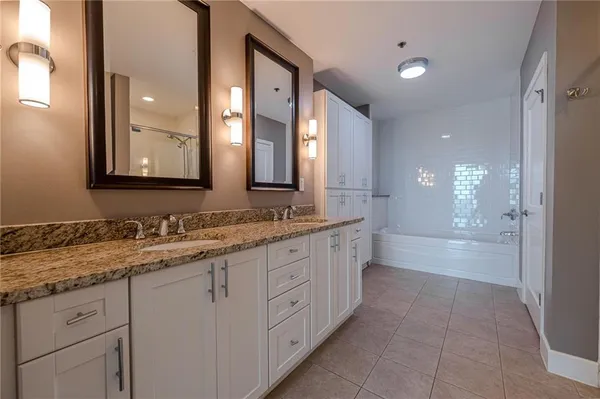 a view of a swimming pool with a lounge chairs