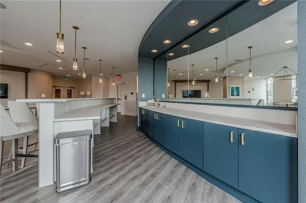 a lobby with furniture and potted plant