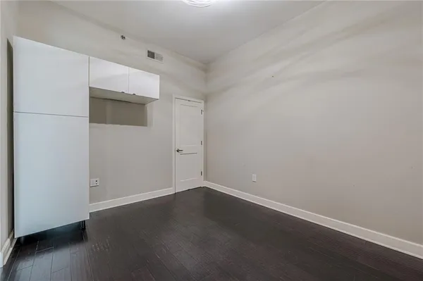 a view of small space with wooden floor