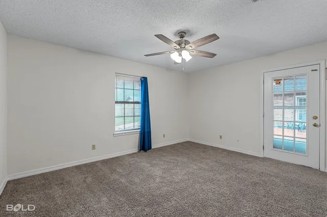 a kitchen with a stove a sink and a microwave