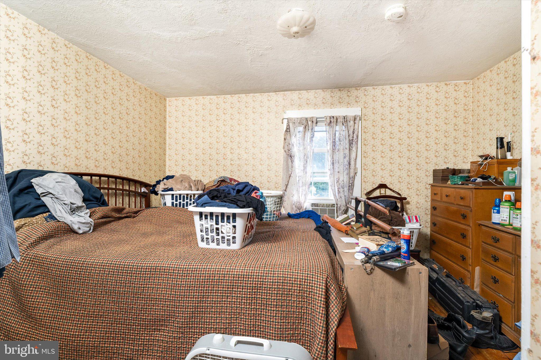 537 Arneytown-chesterfield Road Chesterfield, NJ 08515 - Photo 38 of 87 a bedroom with a bed and a dresser