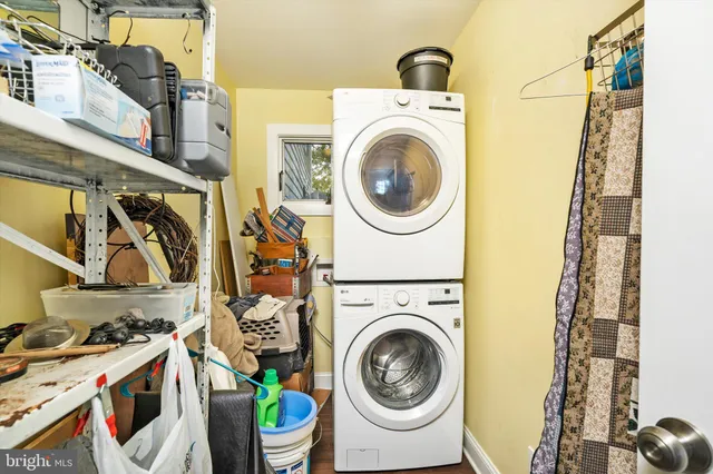a kitchen with stainless steel appliances a refrigerator and a stove top oven