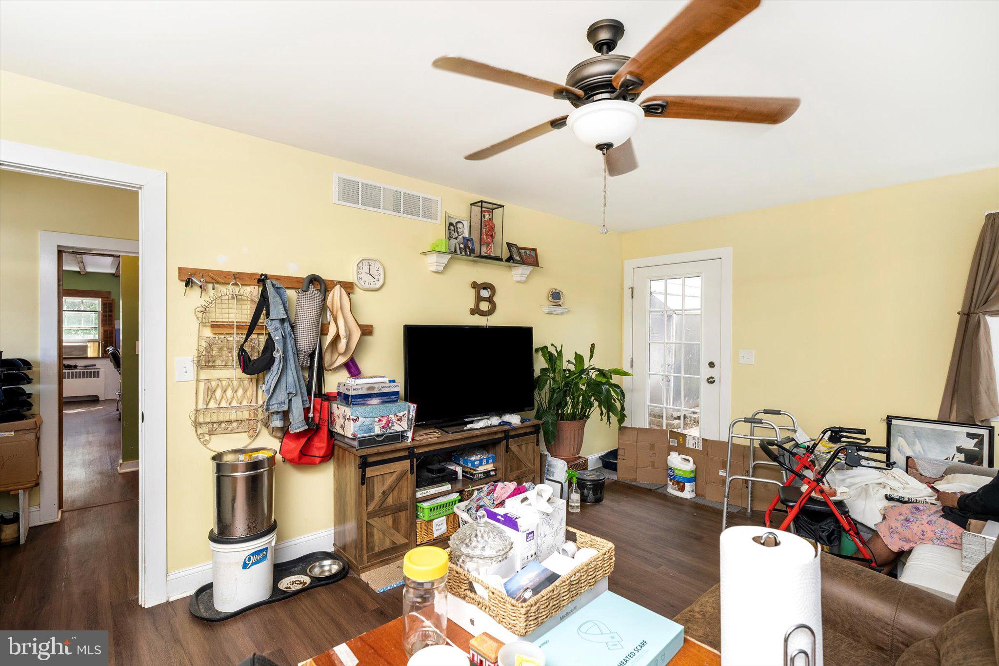 537 Arneytown-chesterfield Road Chesterfield, NJ 08515 - Photo 44 of 87 a living room with furniture and a flat screen tv