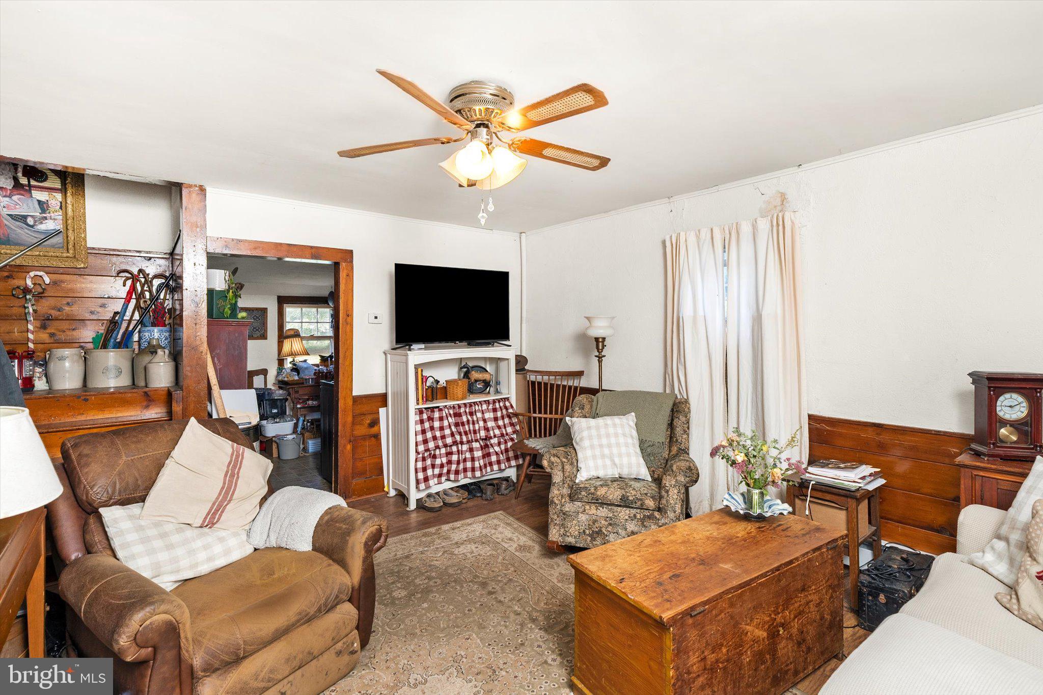 537 Arneytown-chesterfield Road Chesterfield, NJ 08515 - Photo 61 of 87 a living room with furniture and a flat screen tv
