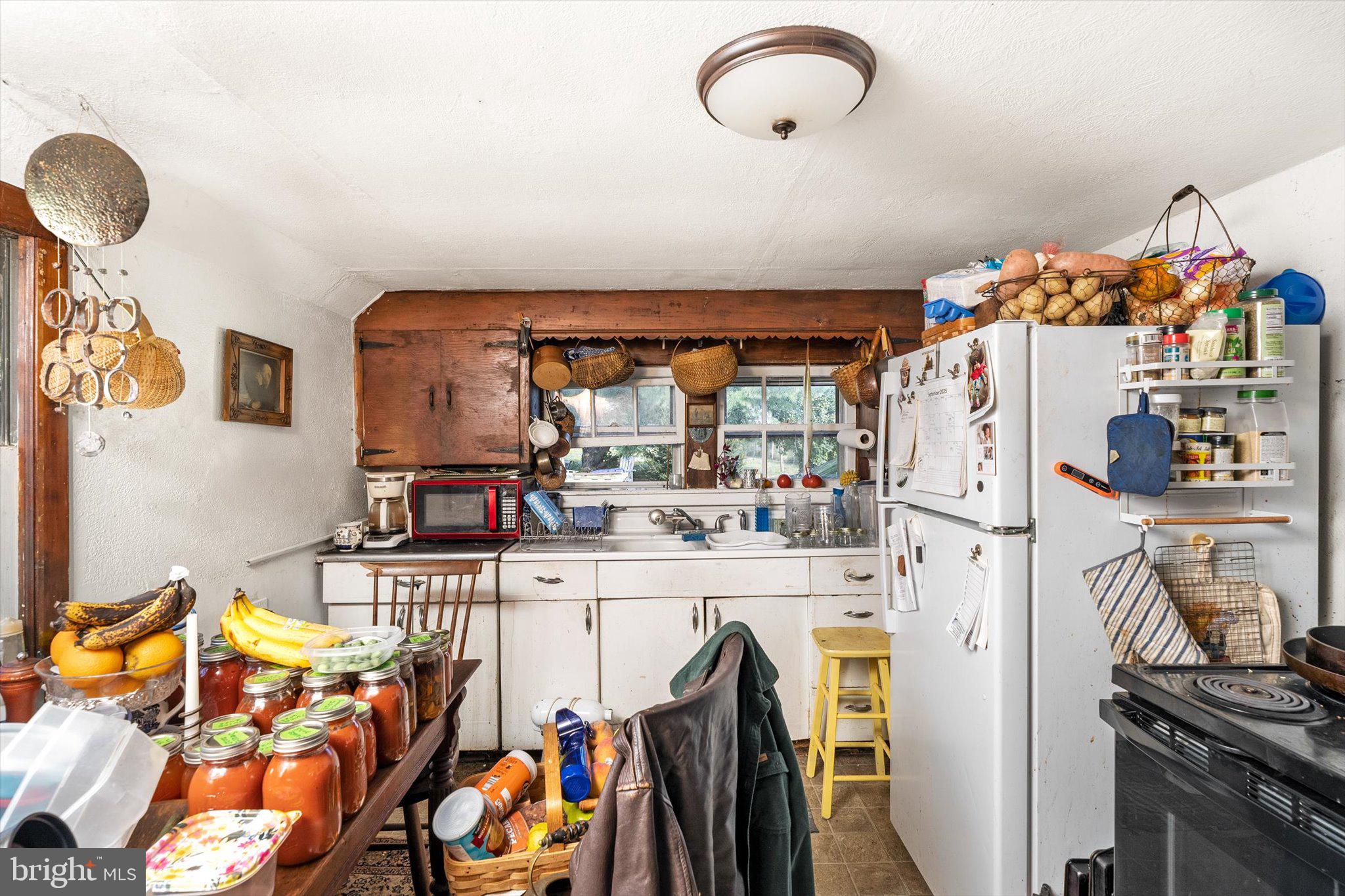 537 Arneytown-chesterfield Road Chesterfield, NJ 08515 - Photo 65 of 87 a kitchen with stainless steel appliances a refrigerator and a stove top oven