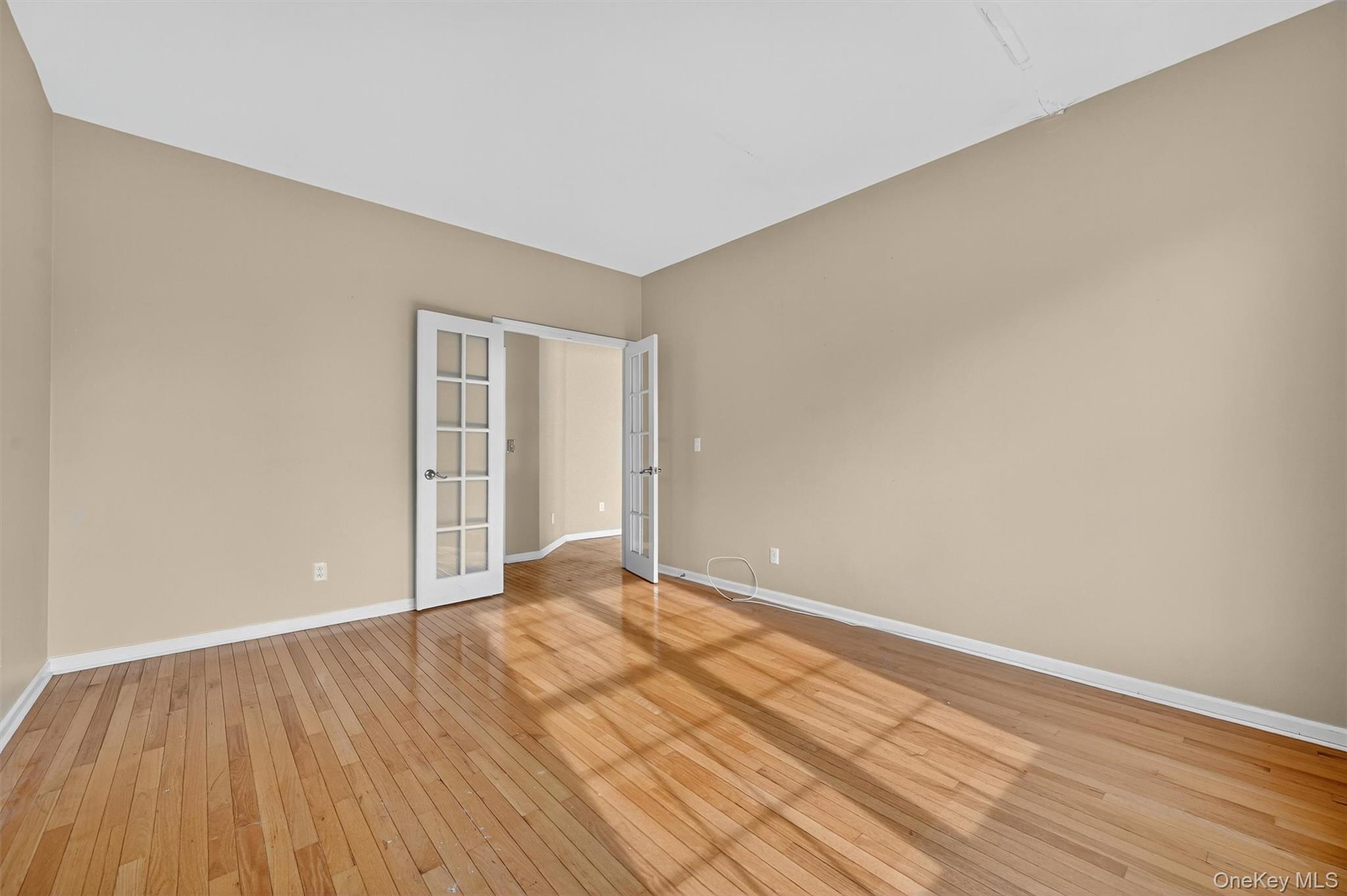 12 Heather Ridge Highland Mills, NY 10930 - Photo 12 of 41 a view of an empty room with wooden floor