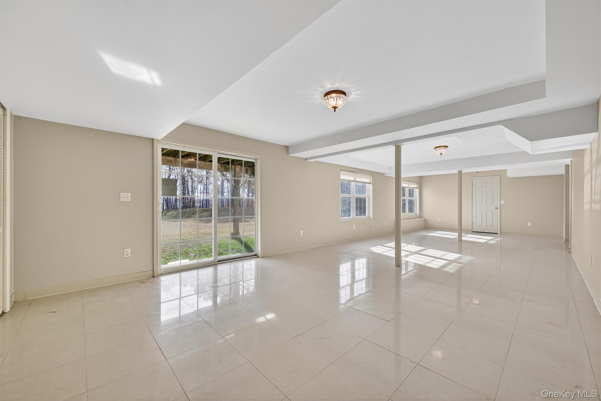 12 Heather Ridge Highland Mills, NY 10930 - Photo 30 of 41 a view of an empty room with glass door