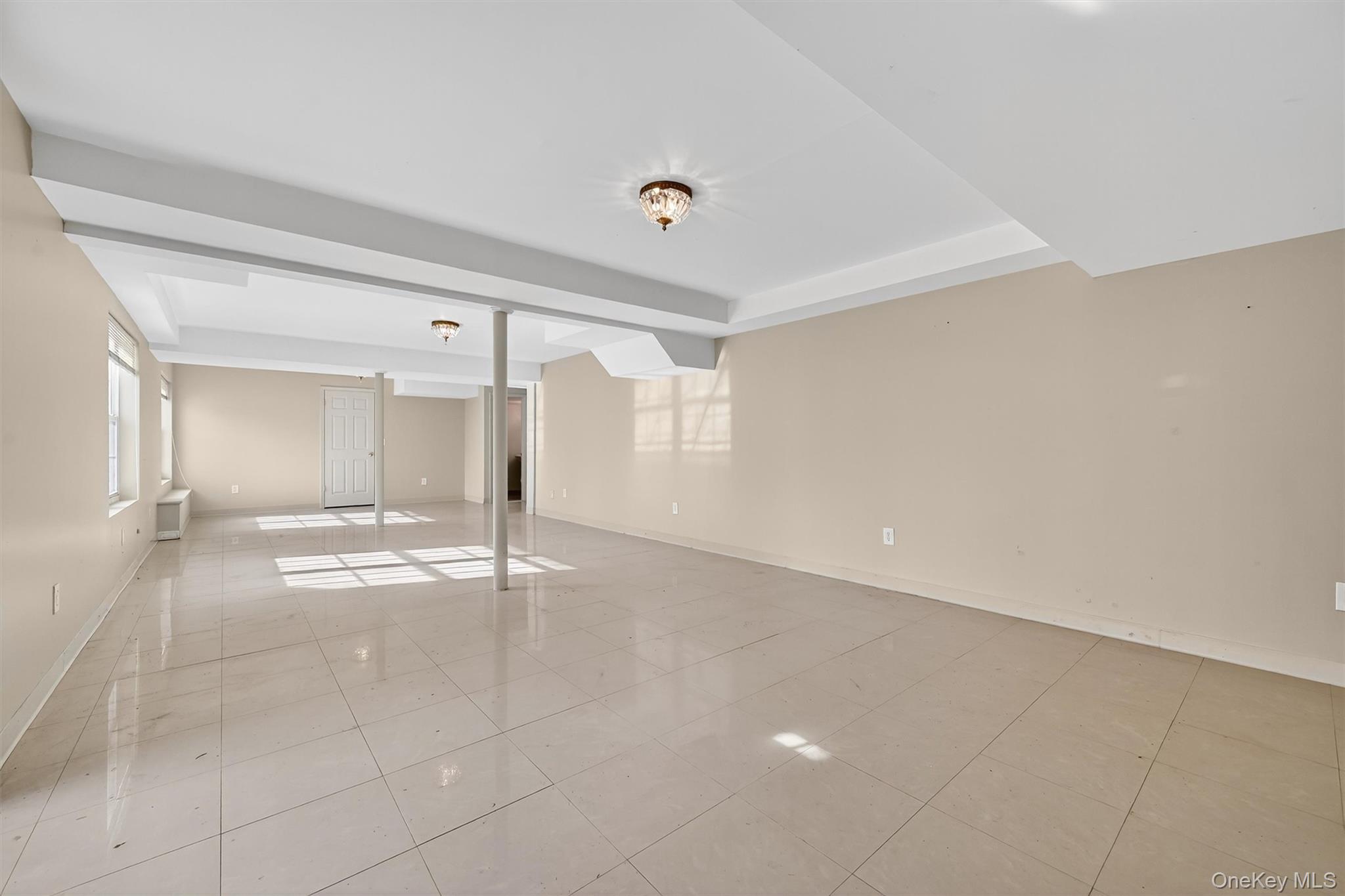 12 Heather Ridge Highland Mills, NY 10930 - Photo 31 of 41 a view of a livingroom with wooden floor and kitchen space with a sink