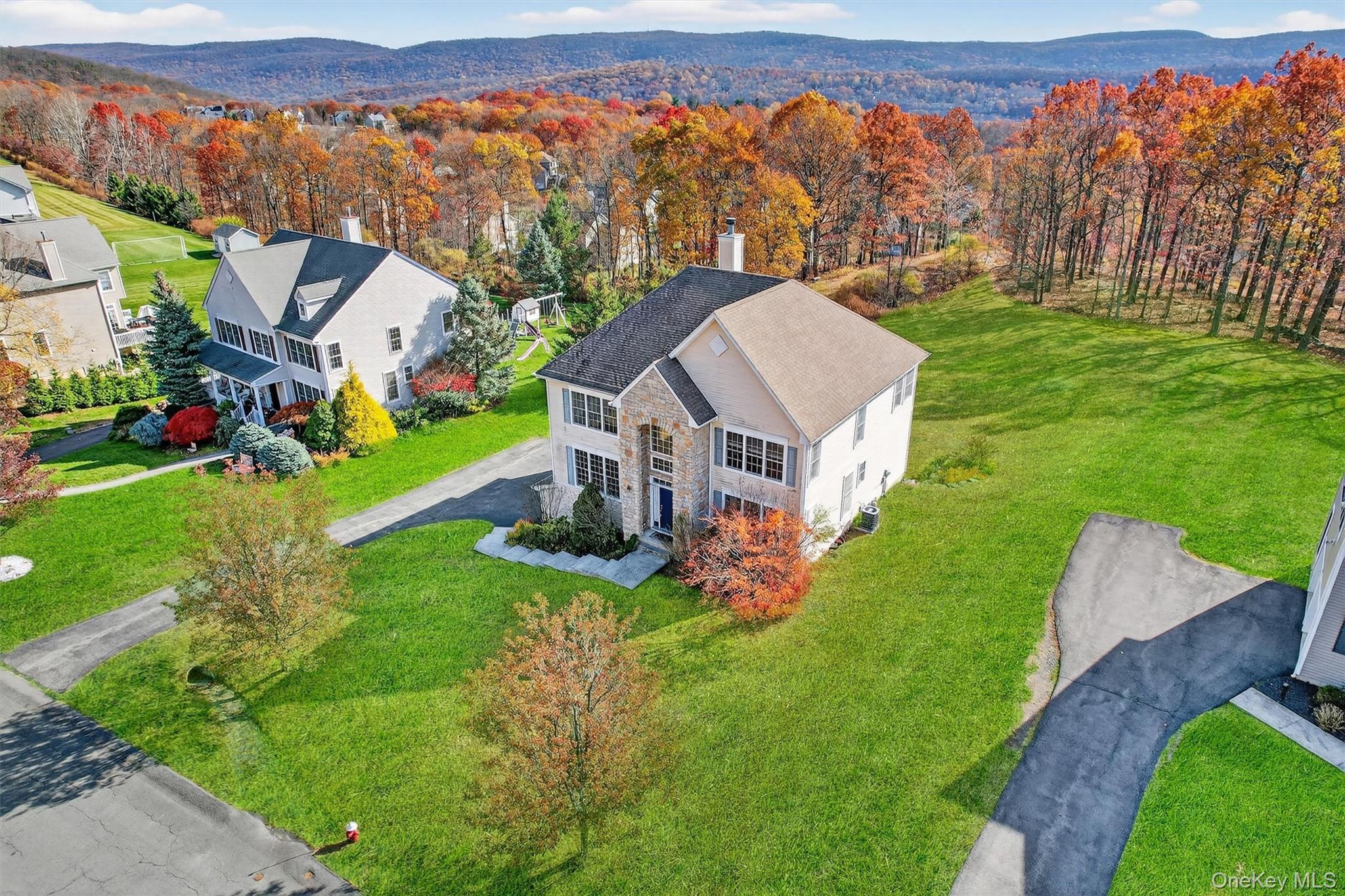 12 Heather Ridge Highland Mills, NY 10930 - Photo 4 of 41 an aerial view of a house with big yard