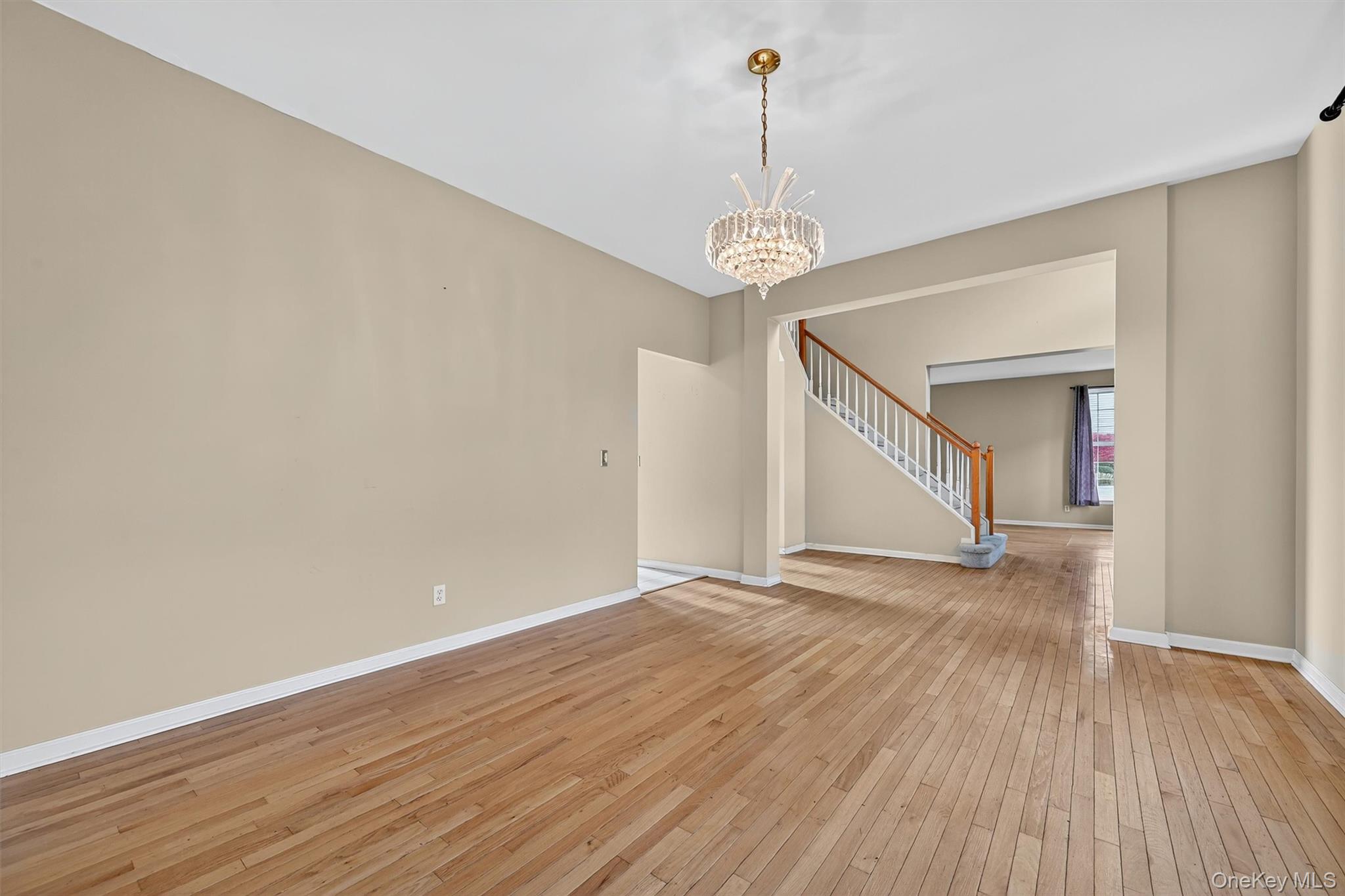 12 Heather Ridge Highland Mills, NY 10930 - Photo 10 of 41 a view of empty room with wooden floor and window