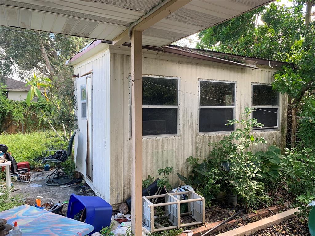 619 Coronado Road Venice, FL 34293 - Photo 8 of 13 BACKYARD SHED