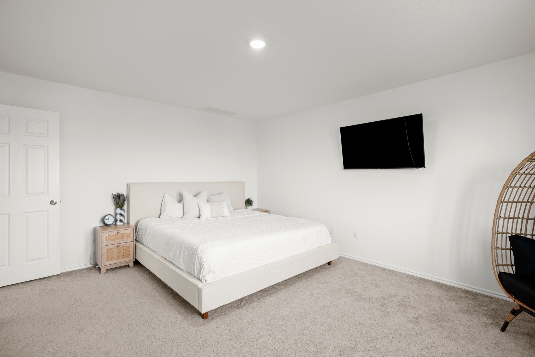 500 Pickrell Loop Georgetown, TX 78628 - Photo 15 of 29 a bedroom with a bed and a flat screen tv