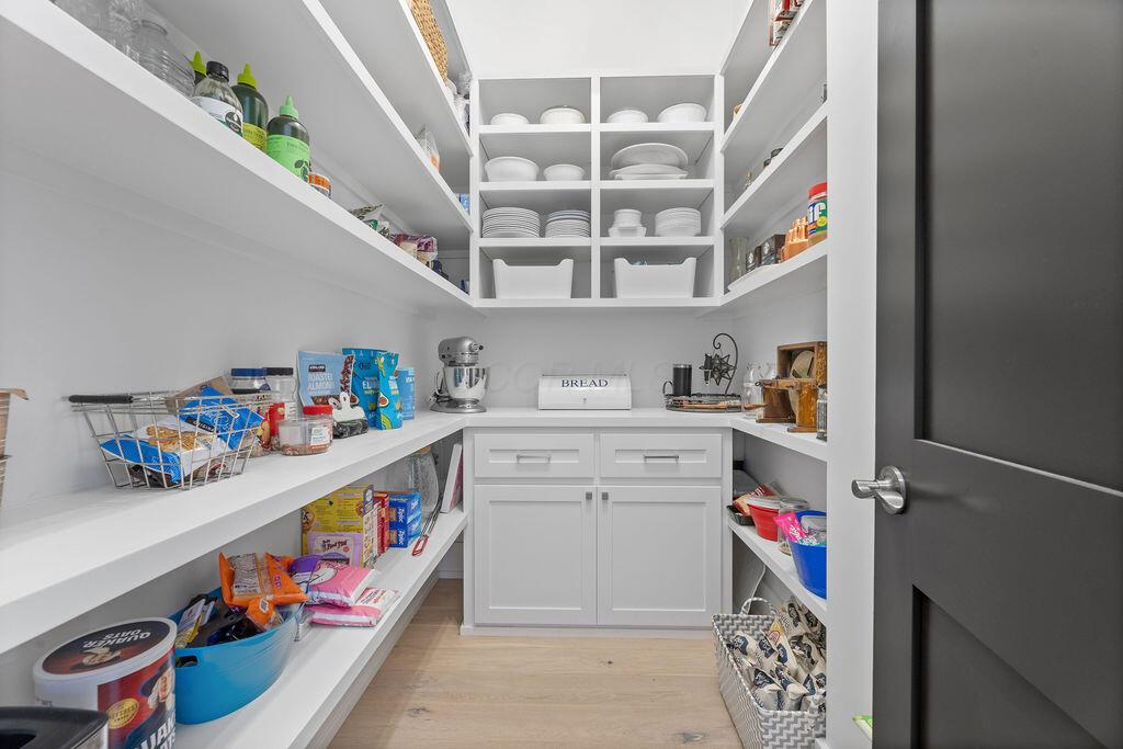 4655 Speranza Loop Galena, OH 43021 - Photo 28 of 61 Walk in pantry with custom wood shelving provides exceptional storage and organization