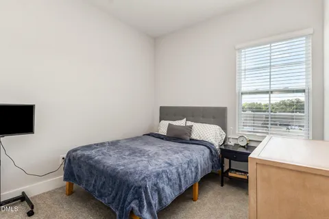 a room with a table and chairs