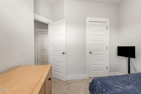 a view of a room with racks on the wall