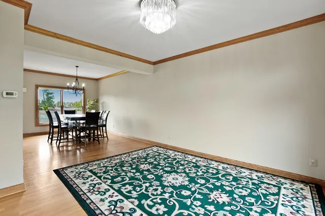 a kitchen with stainless steel appliances granite countertop a refrigerator and sink