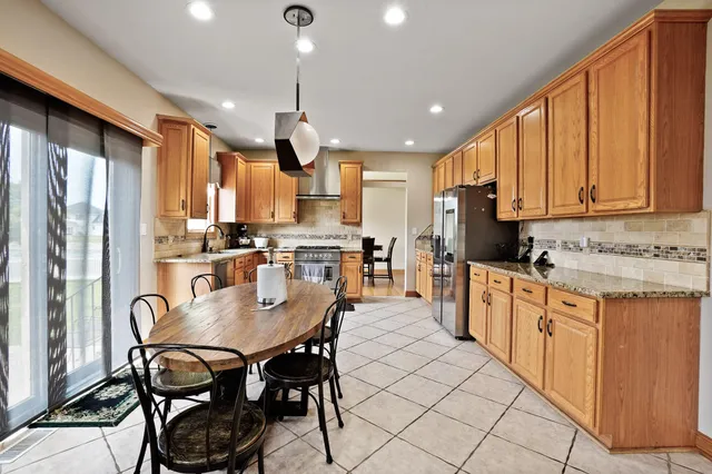 a kitchen with a stove and a microwave