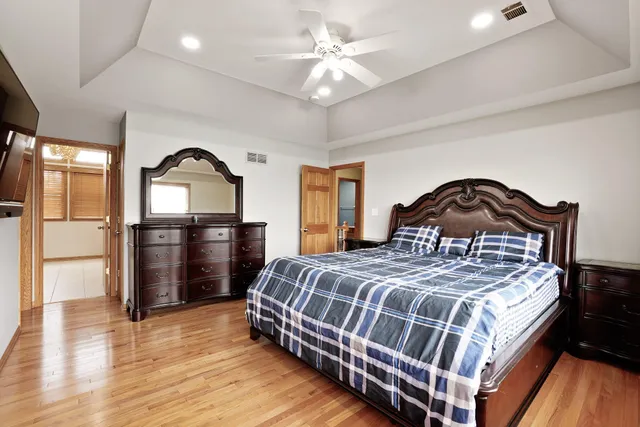 a view of a bedroom from a hallway