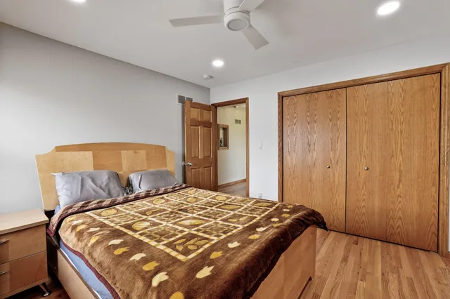 a kitchen with stainless steel appliances granite countertop a stove and a refrigerator