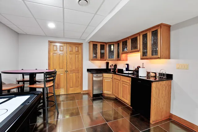 an aerial view of a house with a garden