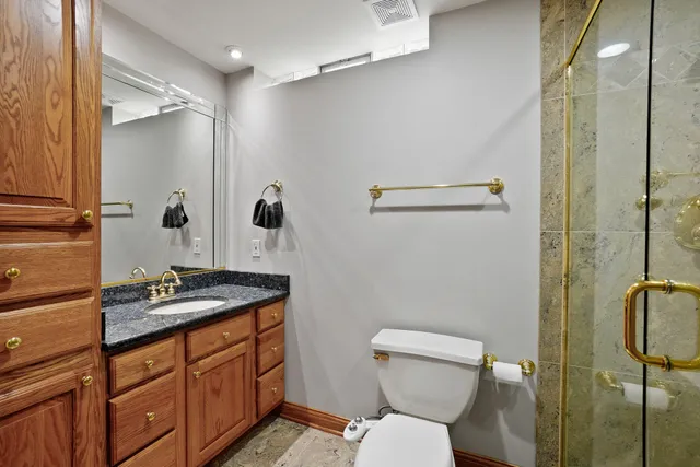 an aerial view of residential houses with outdoor space and swimming pool