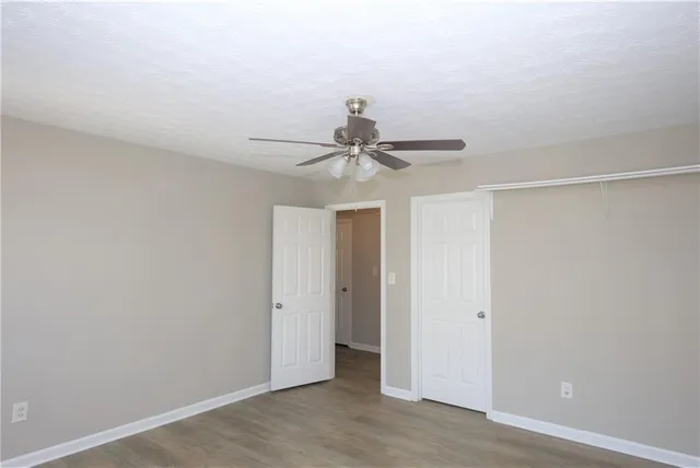 a view of a chandelier fan in a room