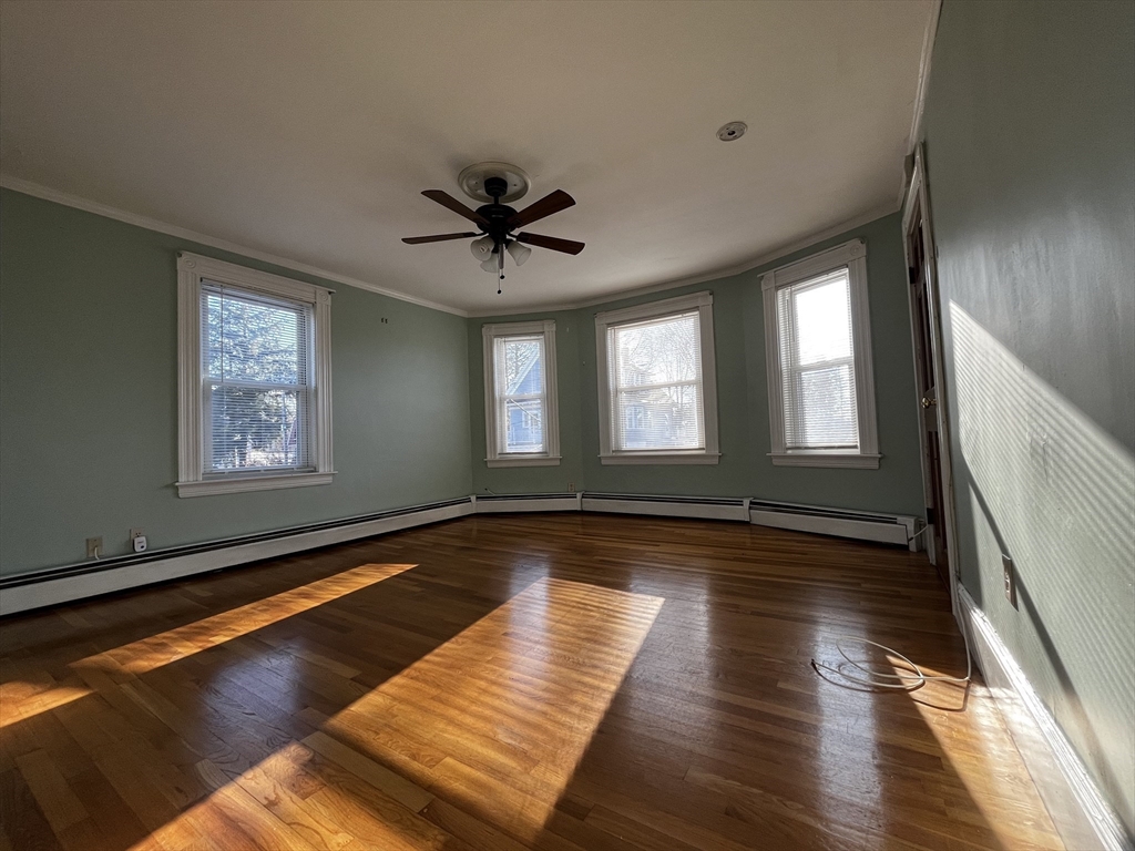 263 Middlesex Street, Unit 2 North Andover, MA 01845 - Photo 5 of 16 a view of a living room and wooden floor
