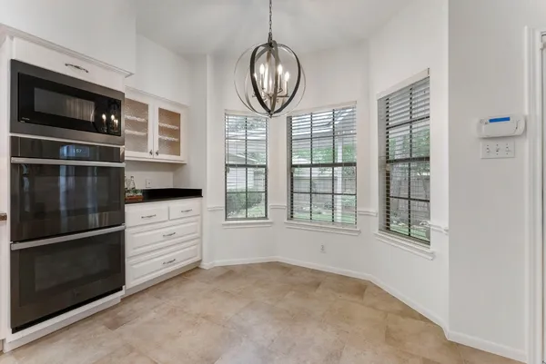 $575,000 | 70 Amberglow Court, The Woodlands, TX 77381