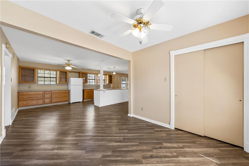 271 Candyce Drive Lorena, TX 76655 - Photo 12 of 27 a view of an empty room with a window and wooden floor