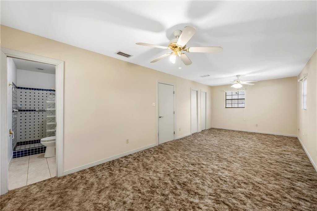271 Candyce Drive Lorena, TX 76655 - Photo 15 of 27 a view of a big room with closet and chandelier fan
