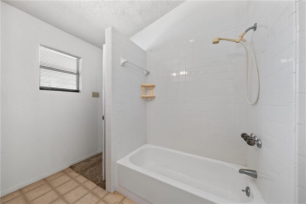 271 Candyce Drive Lorena, TX 76655 - Photo 22 of 27 a bathroom with a bathtub