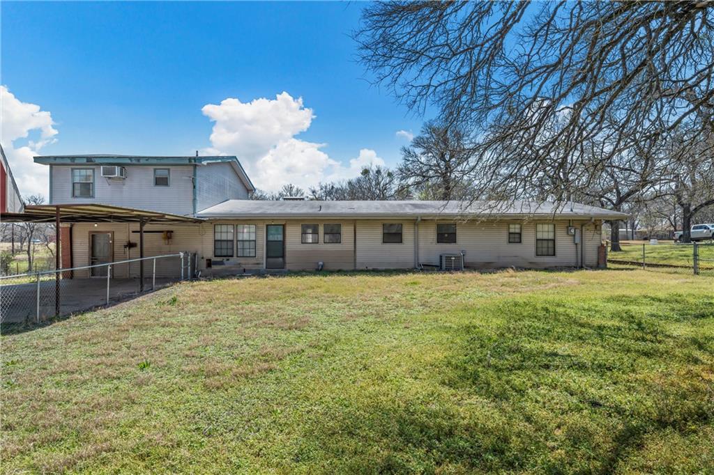 271 Candyce Drive Lorena, TX 76655 - Photo 25 of 27 a front view of a house with a yard and garage