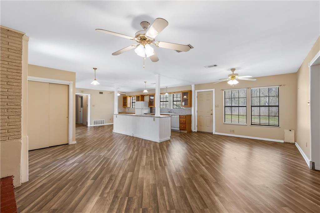 271 Candyce Drive Lorena, TX 76655 - Photo 5 of 27 a view of a kitchen with wooden floor and a kitchen