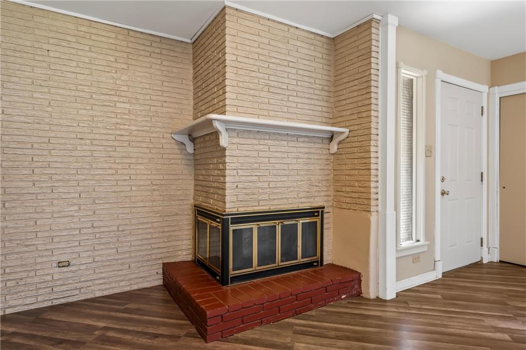 271 Candyce Drive Lorena, TX 76655 - Photo 7 of 27 a view of a livingroom with wooden floor and a bathroom