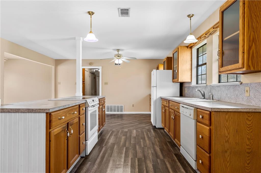 271 Candyce Drive Lorena, TX 76655 - Photo 9 of 27 a kitchen with a sink stove and refrigerator