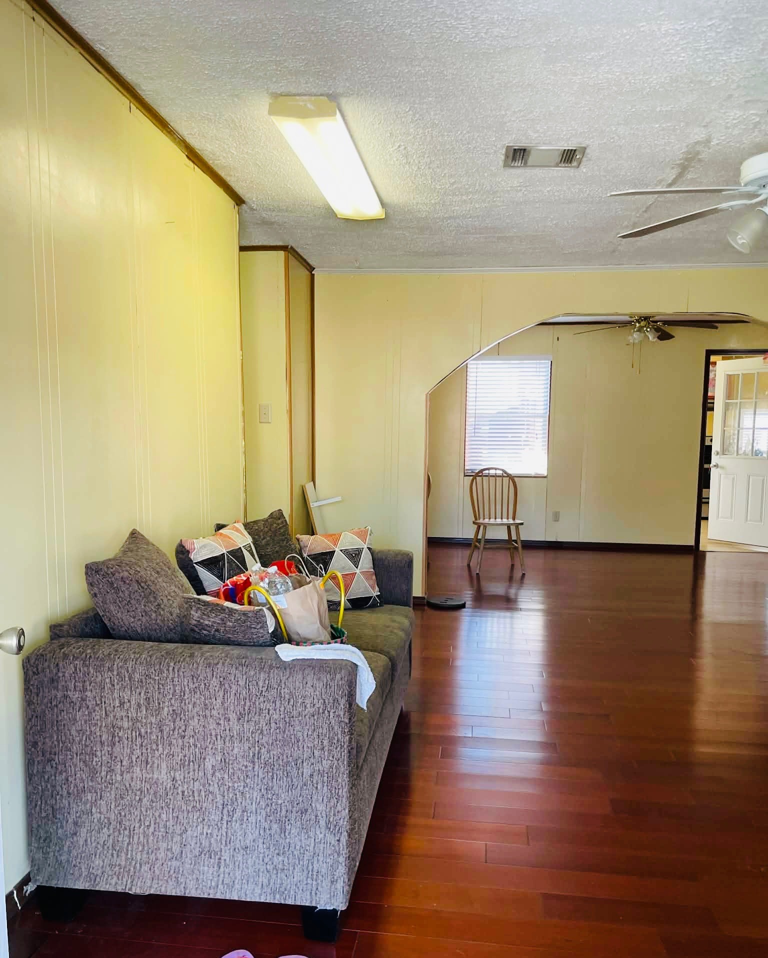 1825 Isom Street Houston, TX 77039 - Photo 14 of 27 a living room with furniture and a wooden floor